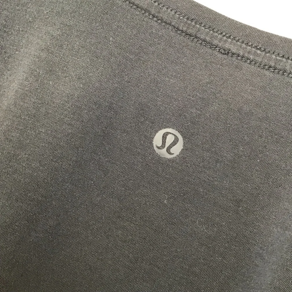 Lululemon Black V Neck Short Sleeve T-Shirt.